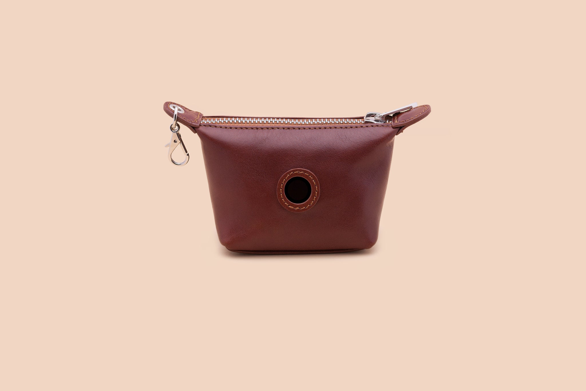 Kotbeutelspender aus Leder in Cognac